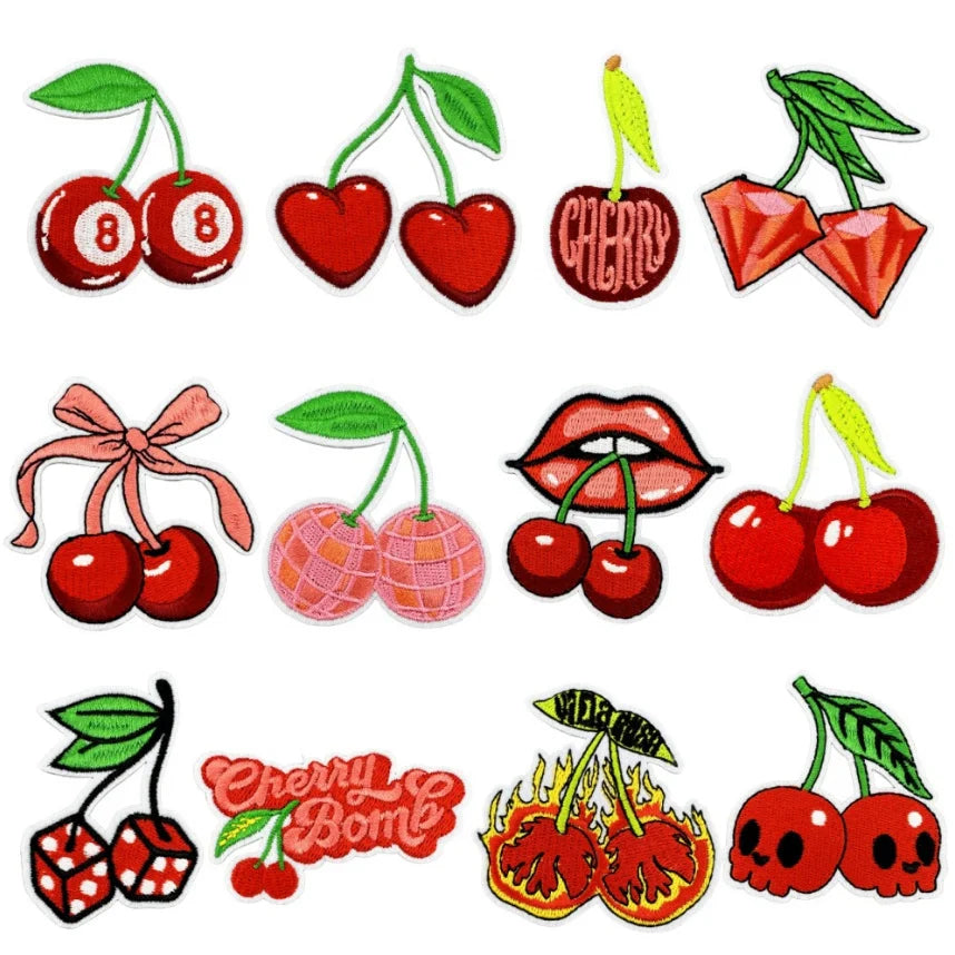 Embroidered fruit patches including cherries, strawberries, and a cherry bomb for iron-on crafting.