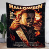 A Halloween themed poster featuring a man with reddish hair and intense expression against a fiery background.