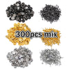 A collection of various metal pin findings including silver, gold, and black butterfly brooch clasps and tie tacks.