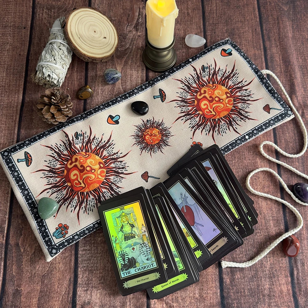 A tarot card storage pouch featuring a mystical tree of life design, surrounded by crystals and a pinecone.