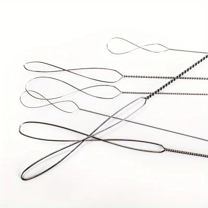 A set of thin stainless steel bead needles used for jewelry making, laid out on a white background.