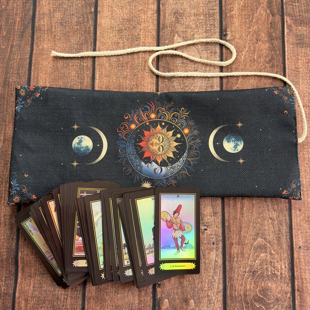 A dark fabric pouch with a celestial design holds a deck of tarot cards.