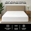 White fitted sheet and pillow set displayed on a bed with text highlighting 100% Egyptian cotton features.