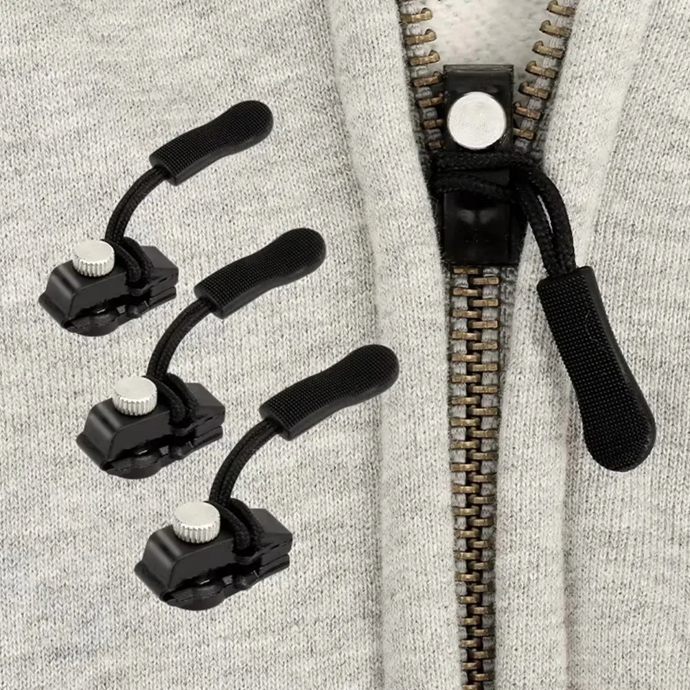 A close-up of a black zipper repair kit attached to a gray knitted garment.