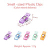 Small sized plastic clips in various colors including purple, blue, pink, and yellow for crafting