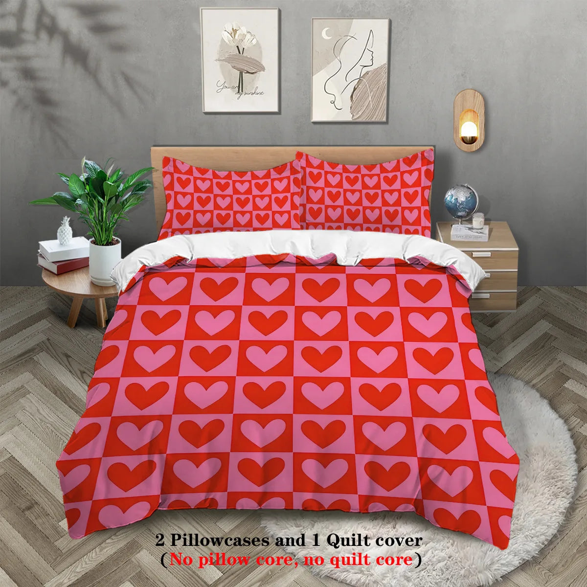 A vibrant red patterned comforter set featuring a heart design on a pink background displayed on a bed.