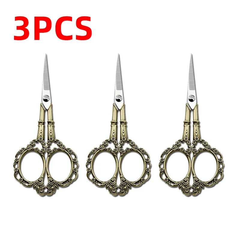 Three pairs of durable stainless steel crafting scissors displayed together.