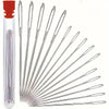 A set of silver sewing needles arranged radially inside a red storage box.