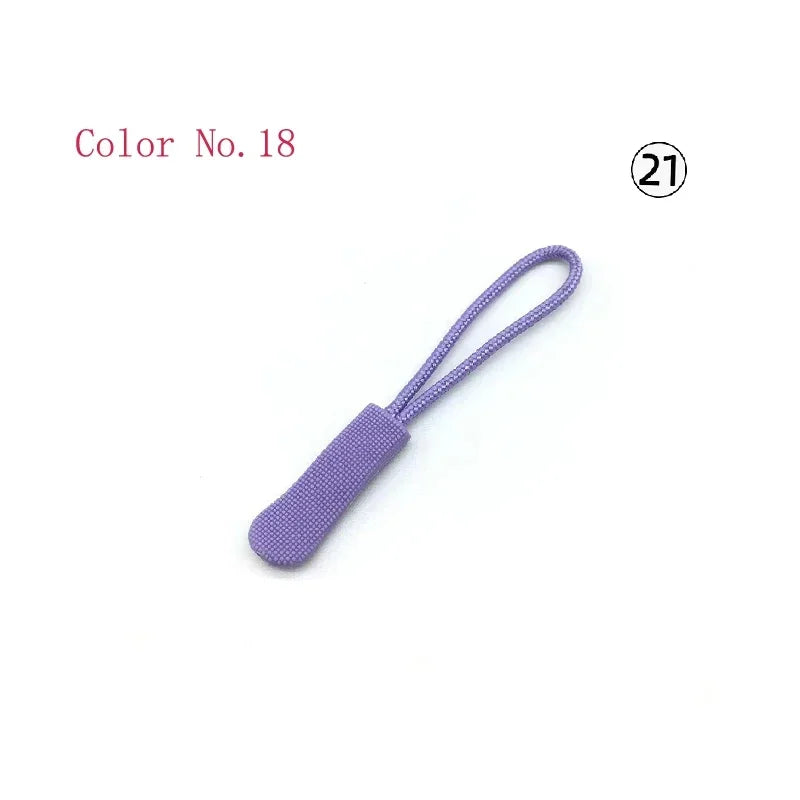 Purple replacement zipper pulls for bags and apparel, labeled Color No. 18.