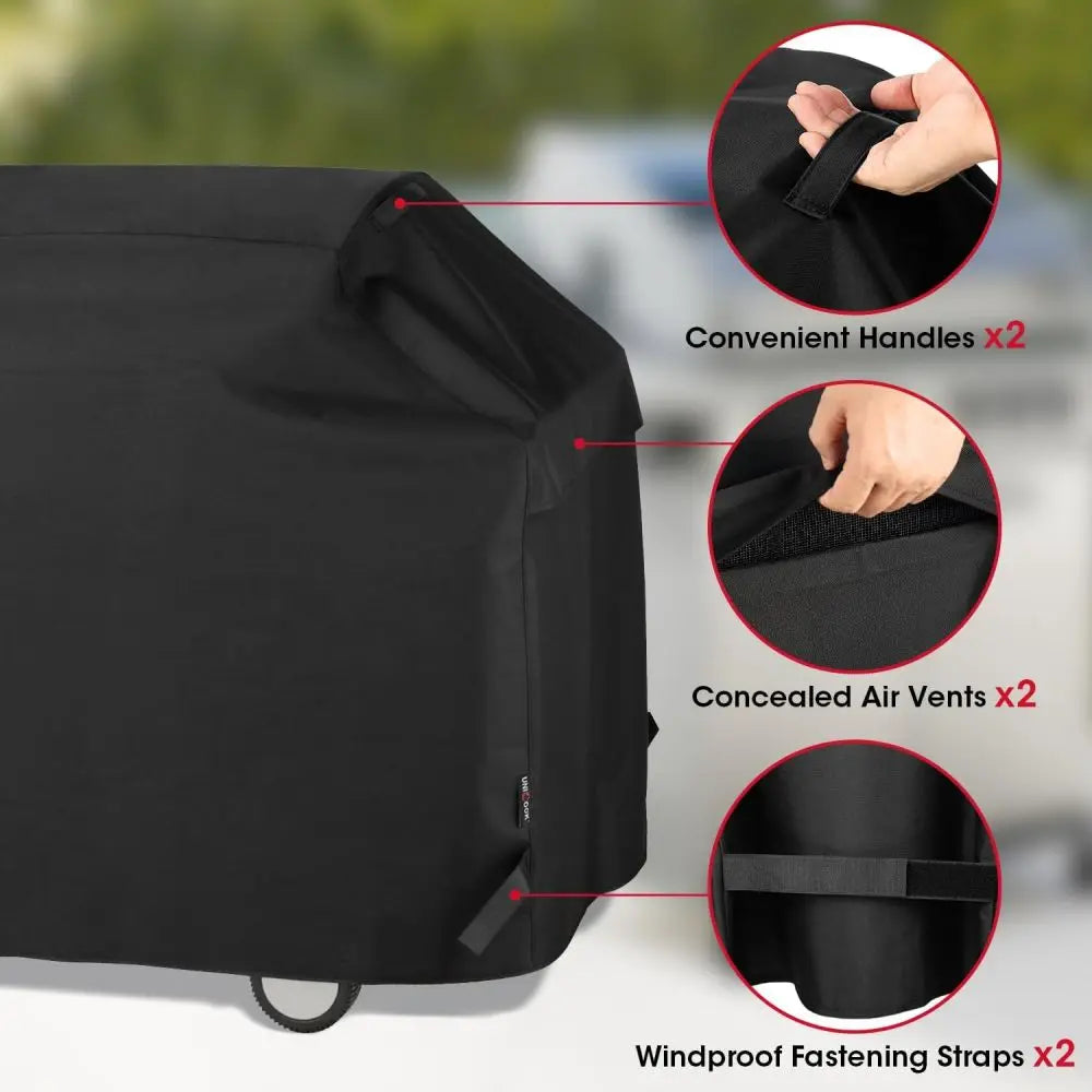 Black waterproof BBQ grill cover showing convenient handles, concealed air vents, and windproof fastening straps.