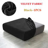 Black velvet fabric sofa seat covers shown in a draped style on a modern gray sofa.
