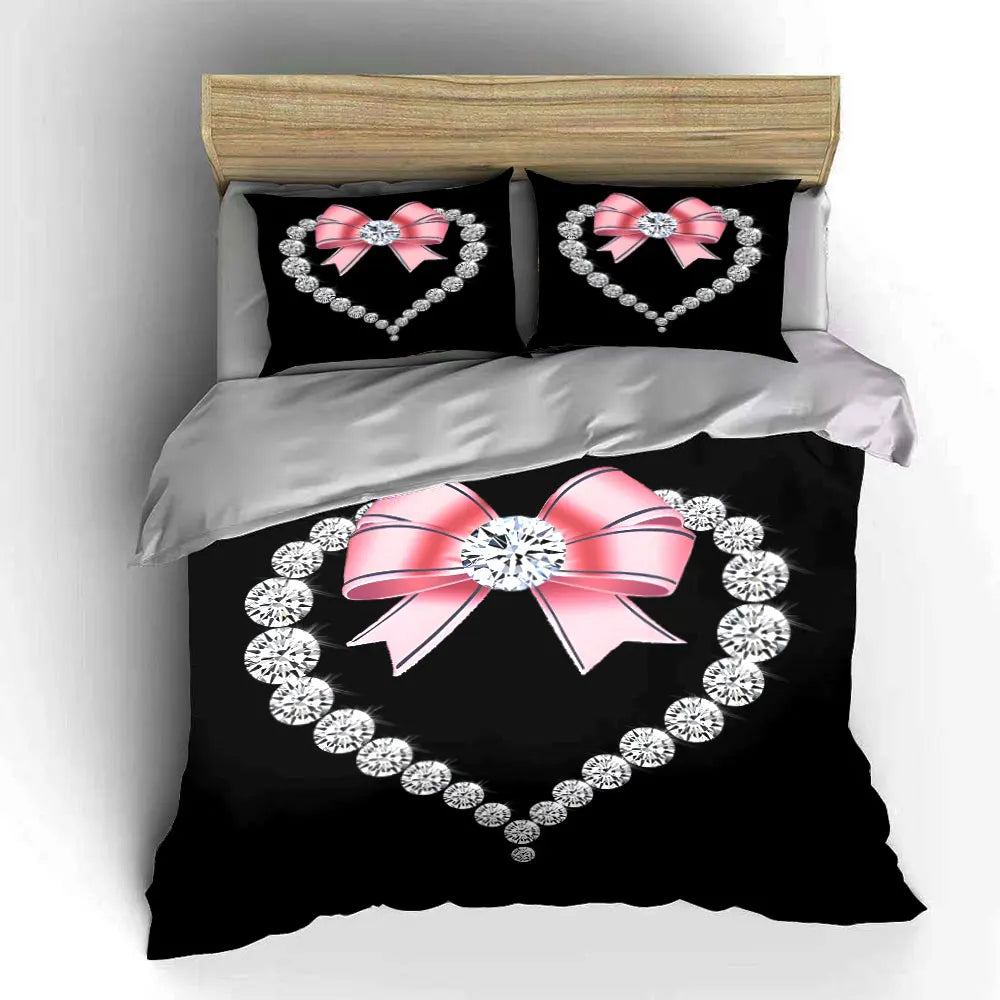 Black bedding set featuring a diamond heart print and pink bow accents.