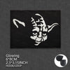 A black patch featuring a white, stylized demonic face design for tactical glow application.