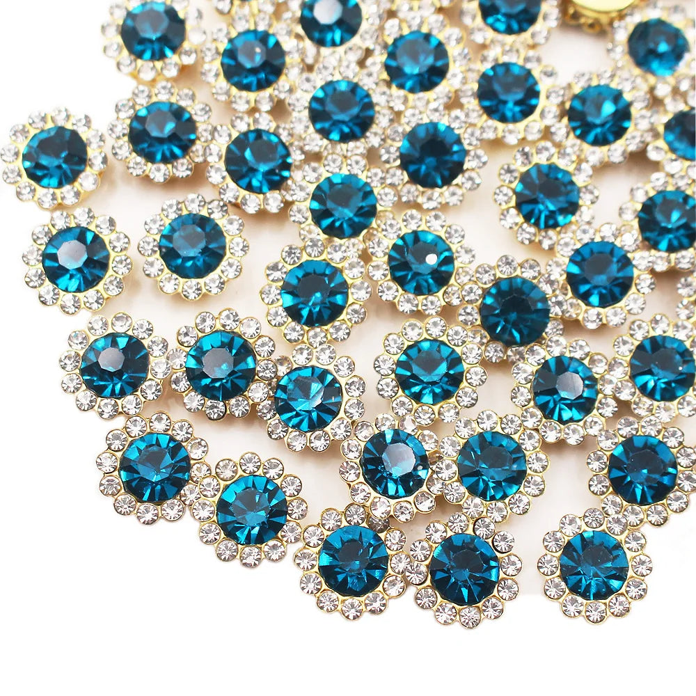 Close-up of sunflower crystal rhinestone sew-on buttons in blue and clear pave setting.