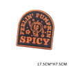 Black embroidered iron-on patch with orange text spelling out FELLIN PUMPKIN SPICY