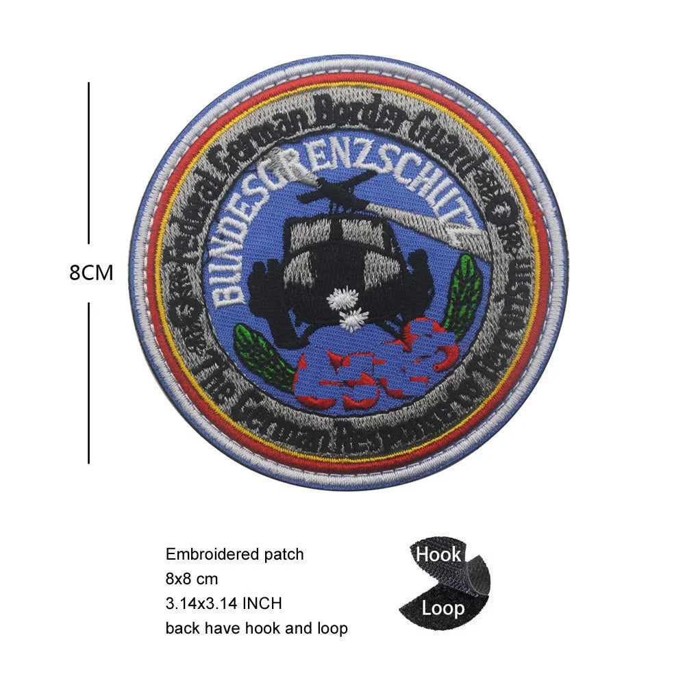 Embroidered patch featuring a circular design with text and an eagle shield motif.
