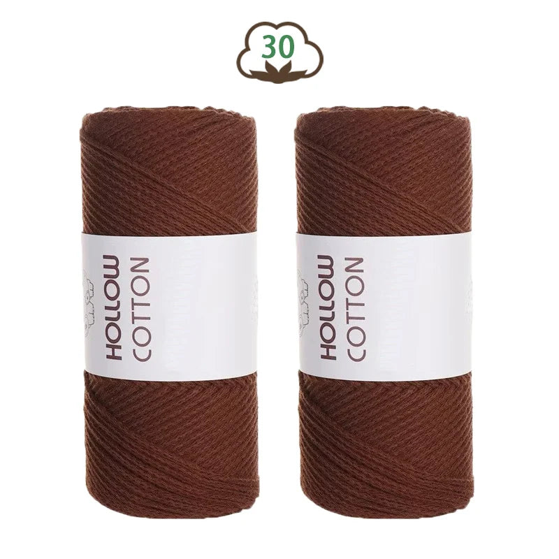 Two spools of dark brown hollow cotton yarn for DIY crafting with a '30' icon above them.