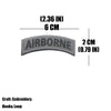 Gray embroidered tactical patch measuring 2.36 inches long and 2 cm wide.