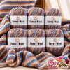 A set of gradient alpaca wool yarn balls in various colors and textures for knitting and crochet projects.