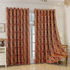 Pair of floor-length tree bark pattern blackout curtains hanging in a light-colored room.