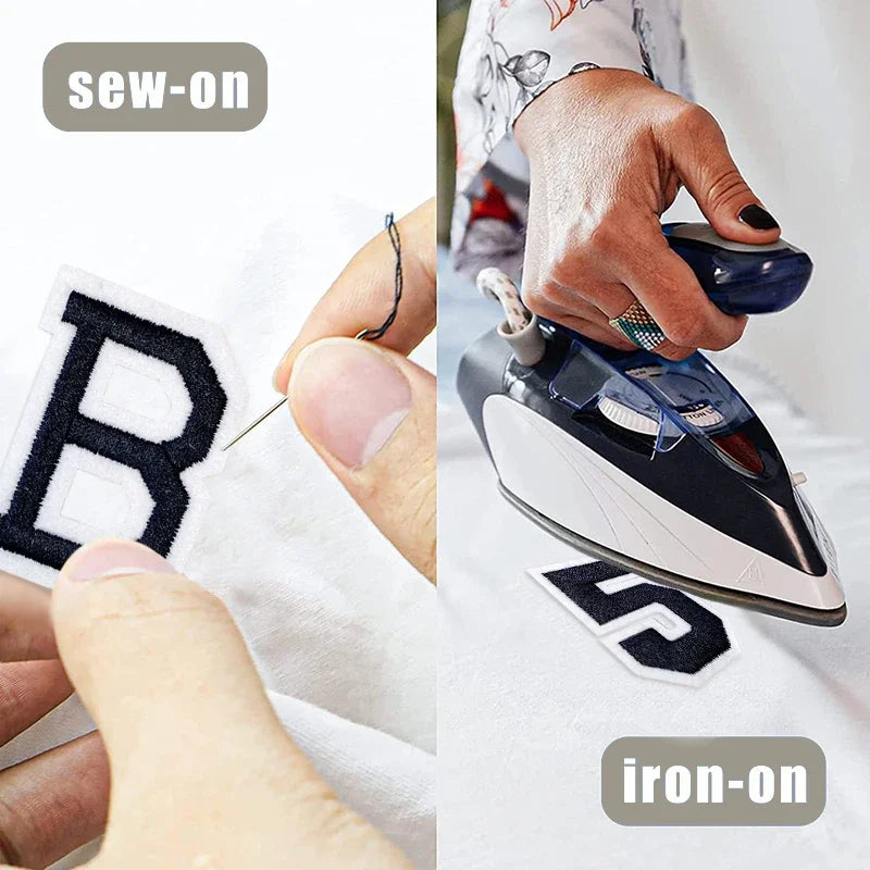 Close-up of a hand using a sewing tool to sew on an embroidery patch onto fabric.