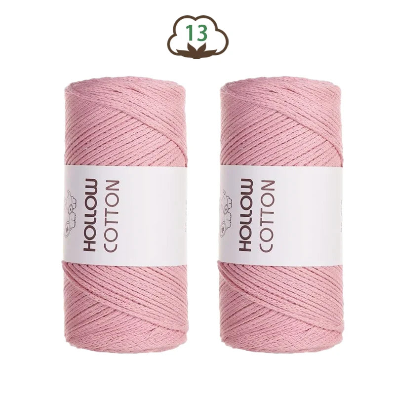Two spools of pink hollow cotton yarn for DIY crafting