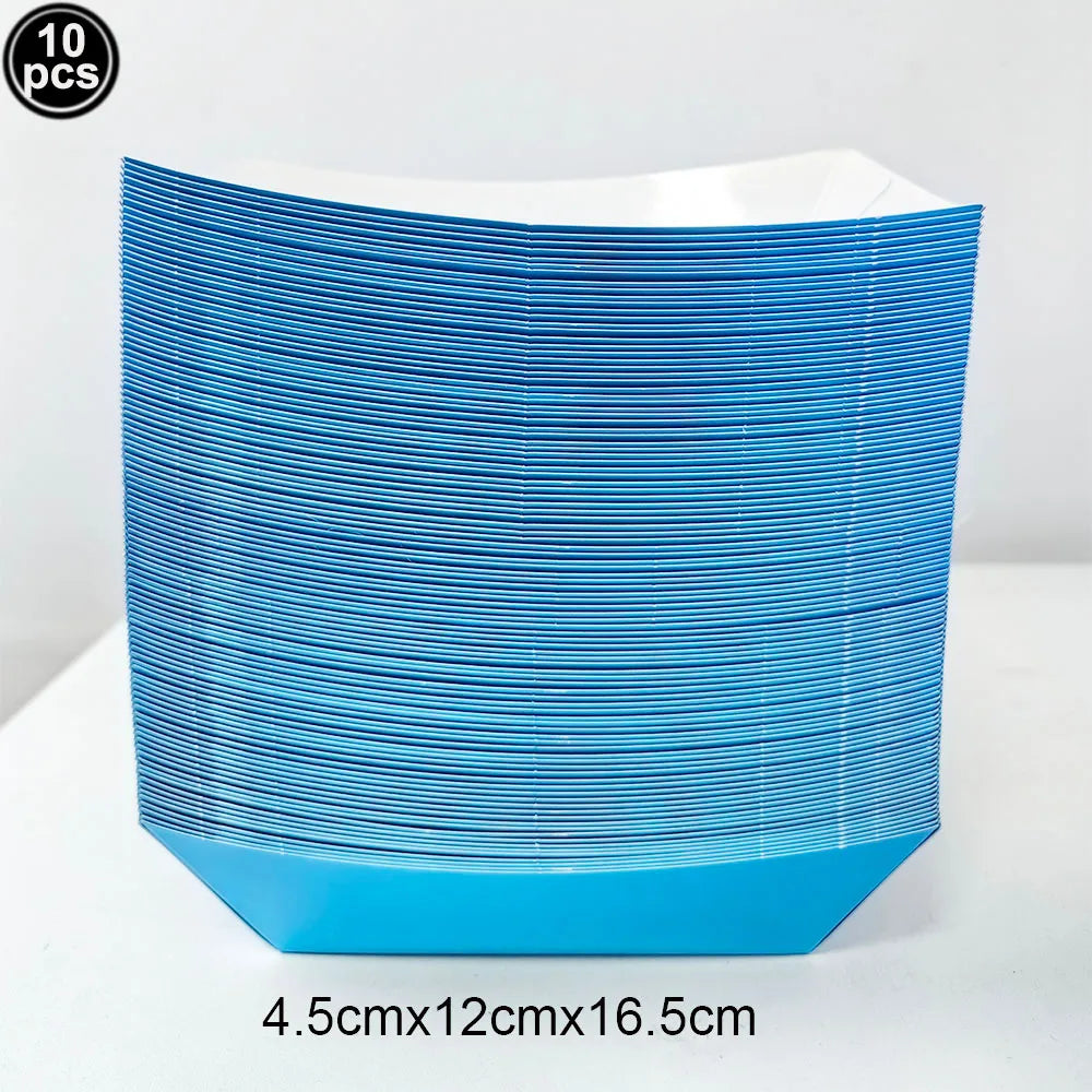 A stack of vibrant solid blue rectangle tablecloths is shown on a white surface.