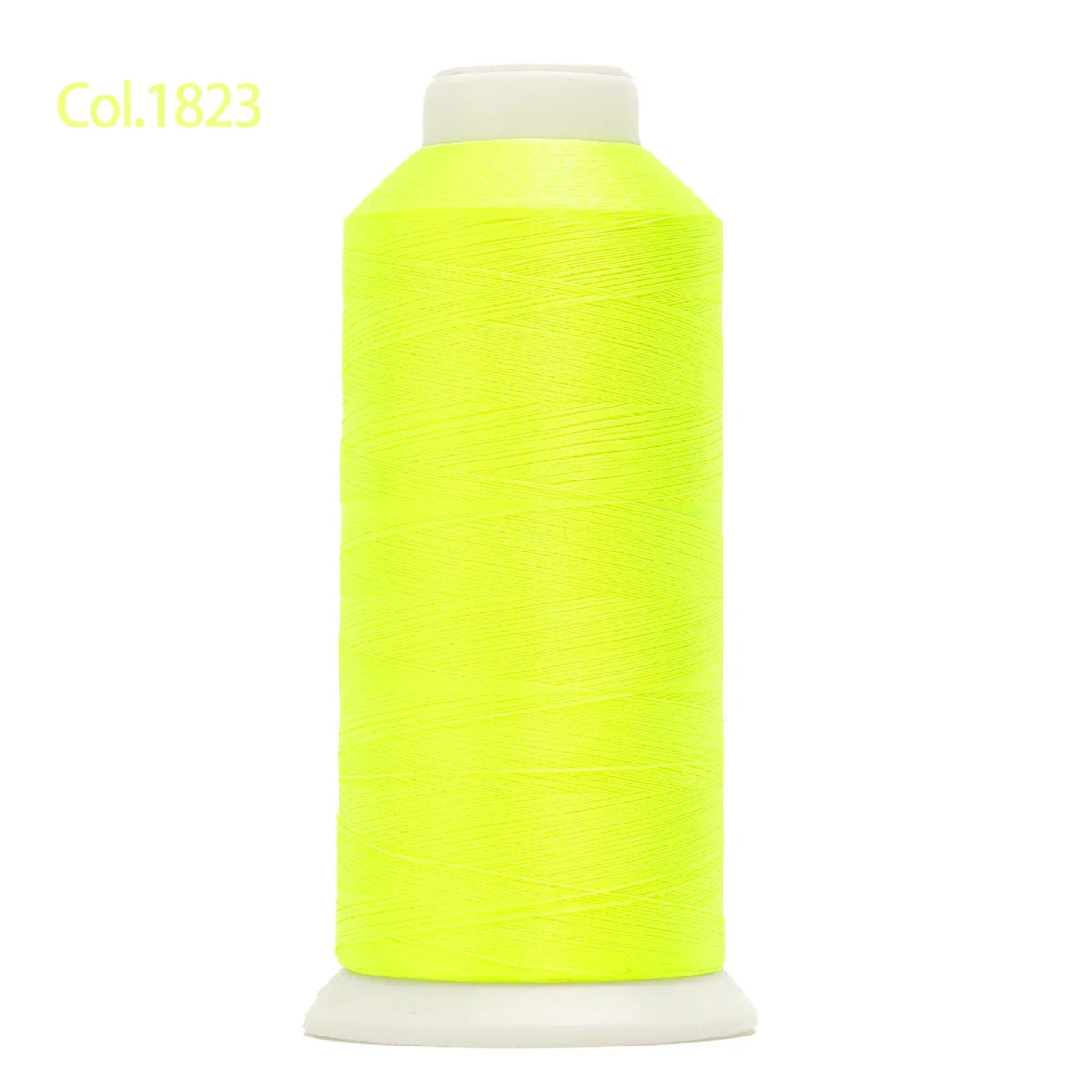 A spool of bright neon yellow embroidery thread labeled Col.1823