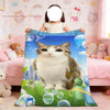 A large graphic featuring a cute cat in a watercolor style on a blanket displayed in a bedroom setting.