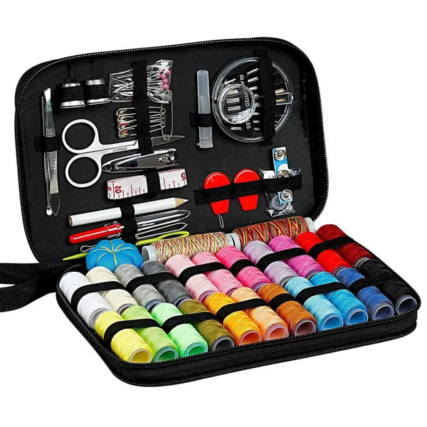 A black sewing and embroidery kit box containing various tools like scissors needles and measuring devices.