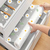 Reusable silicone drawer mat protecting kitchen cabinets and drawers with floral patterns