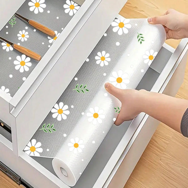 Reusable silicone drawer mat protecting kitchen cabinets and drawers with floral patterns
