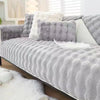 Gray plush rabbit fur sofa cushion cover with white accents and fluffy texture