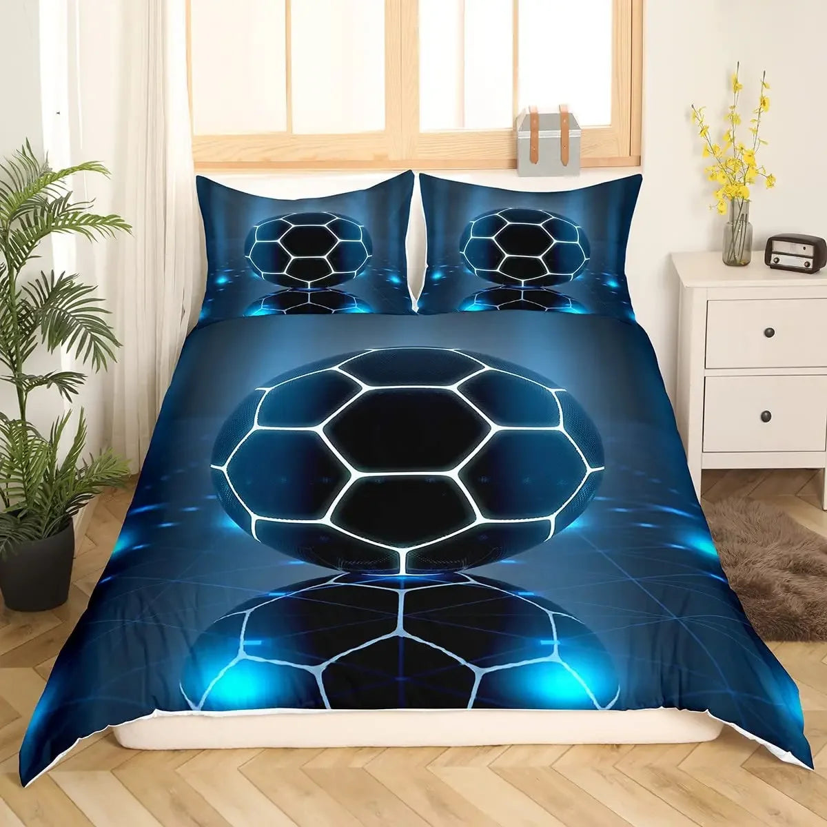 A dark blue duvet cover set featuring a repeating pattern of glowing blue hexagonal footballs on a dark background.