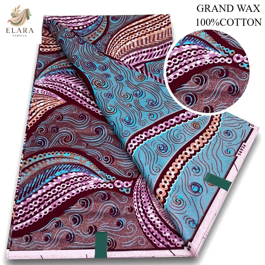 A close-up view of brown and purple African wax print fabric with intricate swirling patterns.