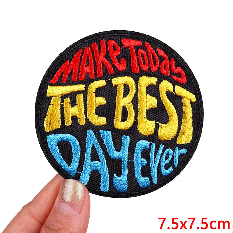 Black embroidered patch with yellow and blue text that reads Make Today The Best Day Ever