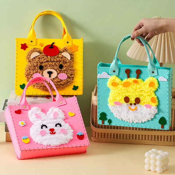 A beginner felt animal craft kit featuring a pink rabbit and a yellow bear in colorful fabric bags.