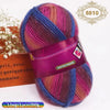 A ball of gradient dyed wool yarn in shades of pink, purple, and blue, tied with a purple ribbon.