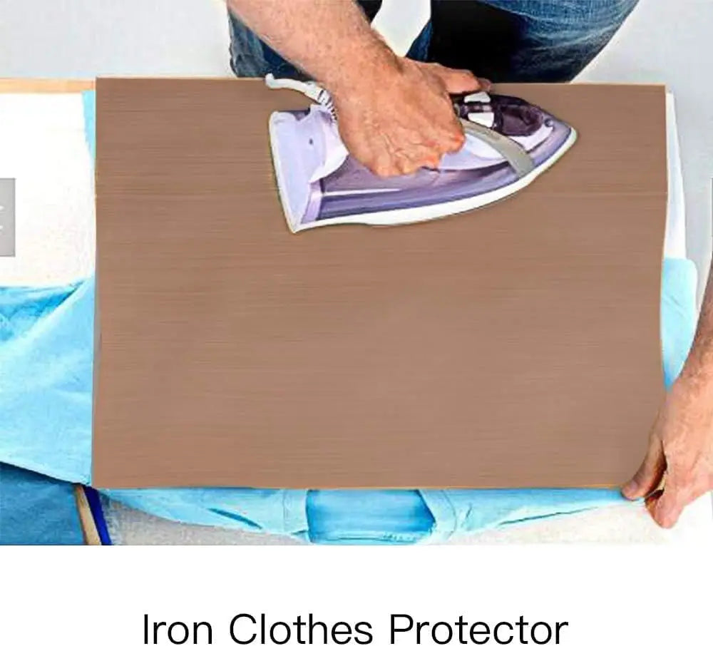 A hand places a purple iron onto a brown heat press transfer sheet for ironing clothes.