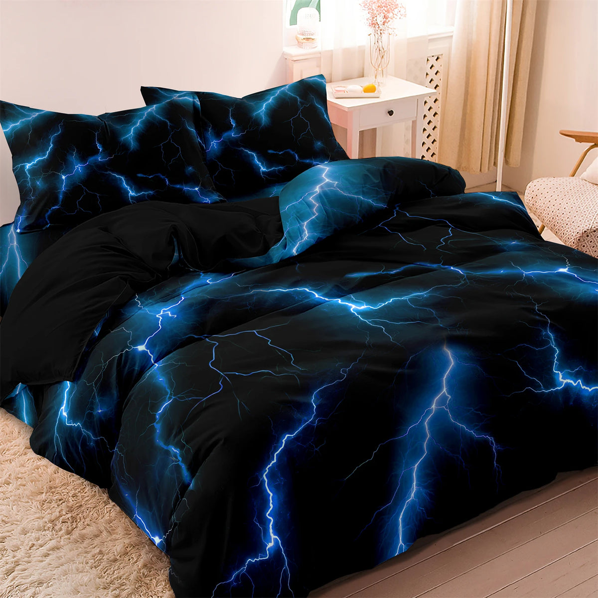A dark blue and black duvet cover set featuring a lightning bolt print on a bed.