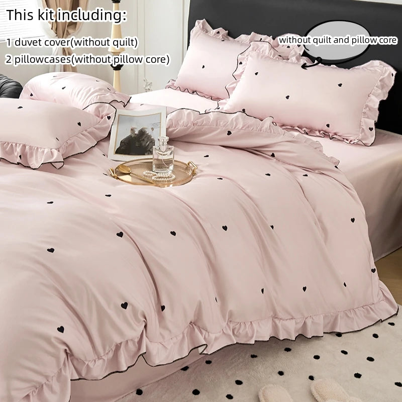A pink Korean lace duvet cover set including a duvet cover, two pillowcases, and a pillow core.