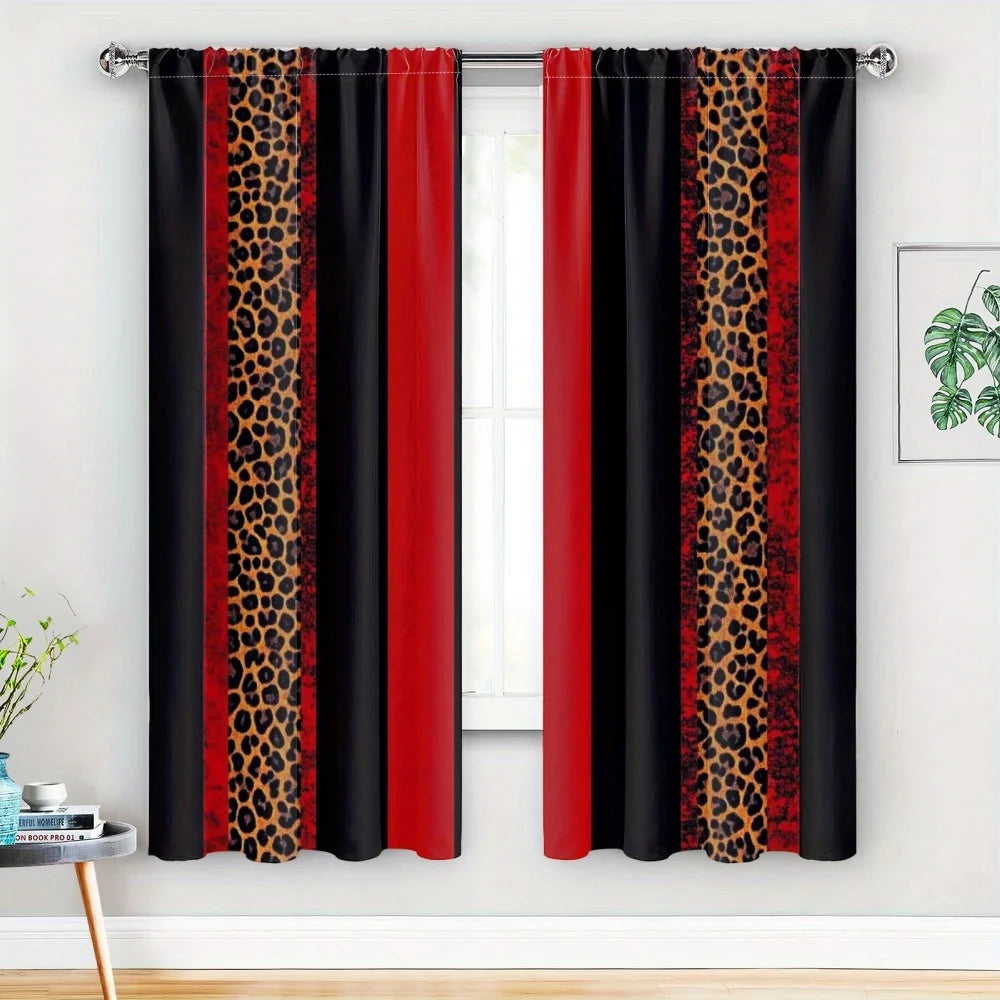 A set of two black curtains with vertical leopard print stripes in red and black fabric.