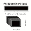 A set of one table runner and six placemats featuring a black geometric design.