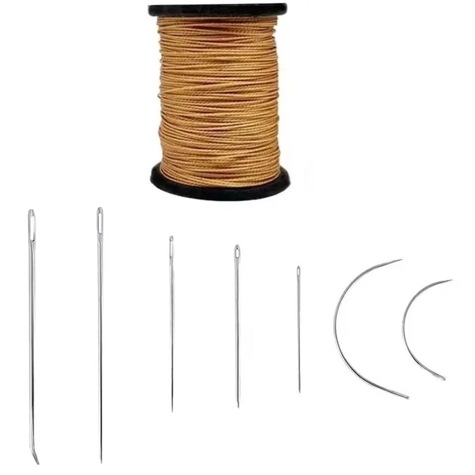 A spool of waxed leather thread and several metal sewing needles.
