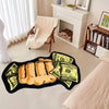 A black non-slip throw rug features a design of a golden hand making a fist with $100 bills.