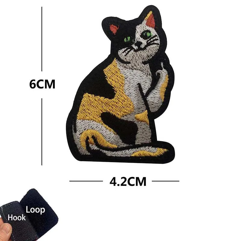 Black and orange cat embroidered patch featuring a funny animal meme design