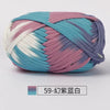 A ball of hand-dyed fabric strip yarn featuring horizontal stripes of teal, pink, and white.