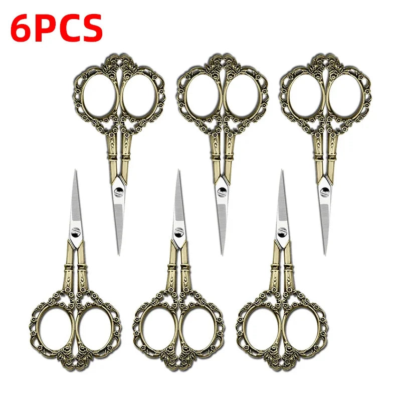 Six pairs of durable stainless steel crafting scissors displayed together.
