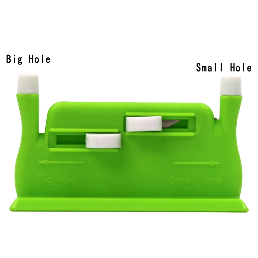 A green automatic double-head sewing needle threader with large and small holes for threading.