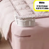 White non-slip bed sheet fasteners shown on a pink bed sheet.